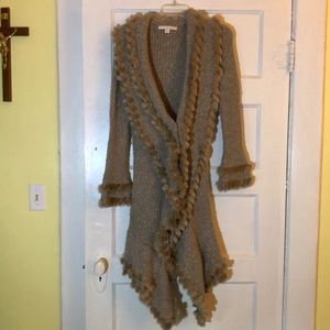 Cute asymmetrical sweater coat wit faux fur trim